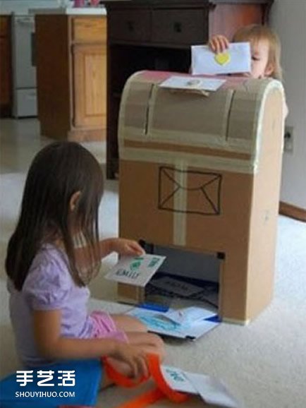 废纸箱儿童玩具图片 超好玩的纸箱做玩具作品 -  www.shouyihuo.com